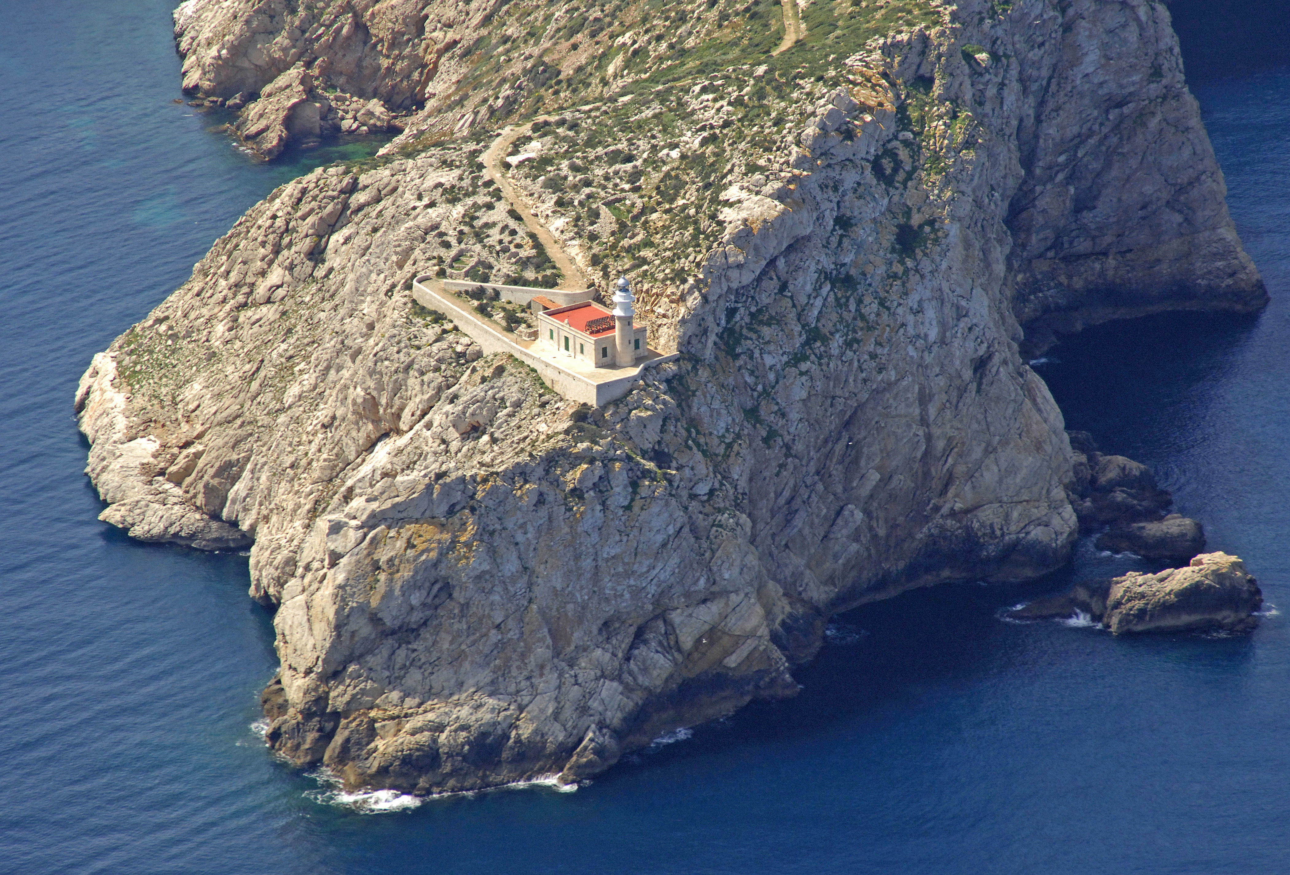 Punta Tramontana Light Cap De Tramuntana Light Lighthouse In Sant Elm 